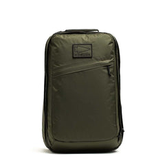 GORUCK GR2 34L backpack in dark green with a diagonal front zippered stash pocket and GORUCK logo patch