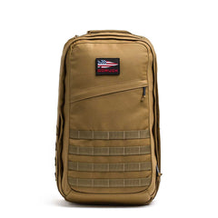 The GR2 USA - Cordura is a tan tactical travel backpack with a front patch and horizontal webbing straps, perfect as a rugged carry-on rucksack for any adventure.