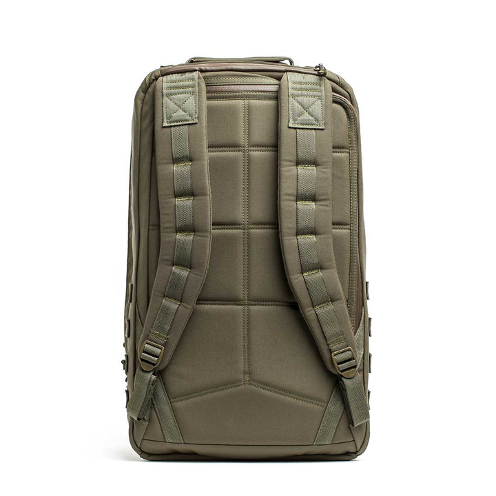 The GR2 USA - Cordura is an olive green travel backpack with a padded back and adjustable shoulder straps, shown from the rear—ideal for comfort as a carry-on or durable Special Forces bag.