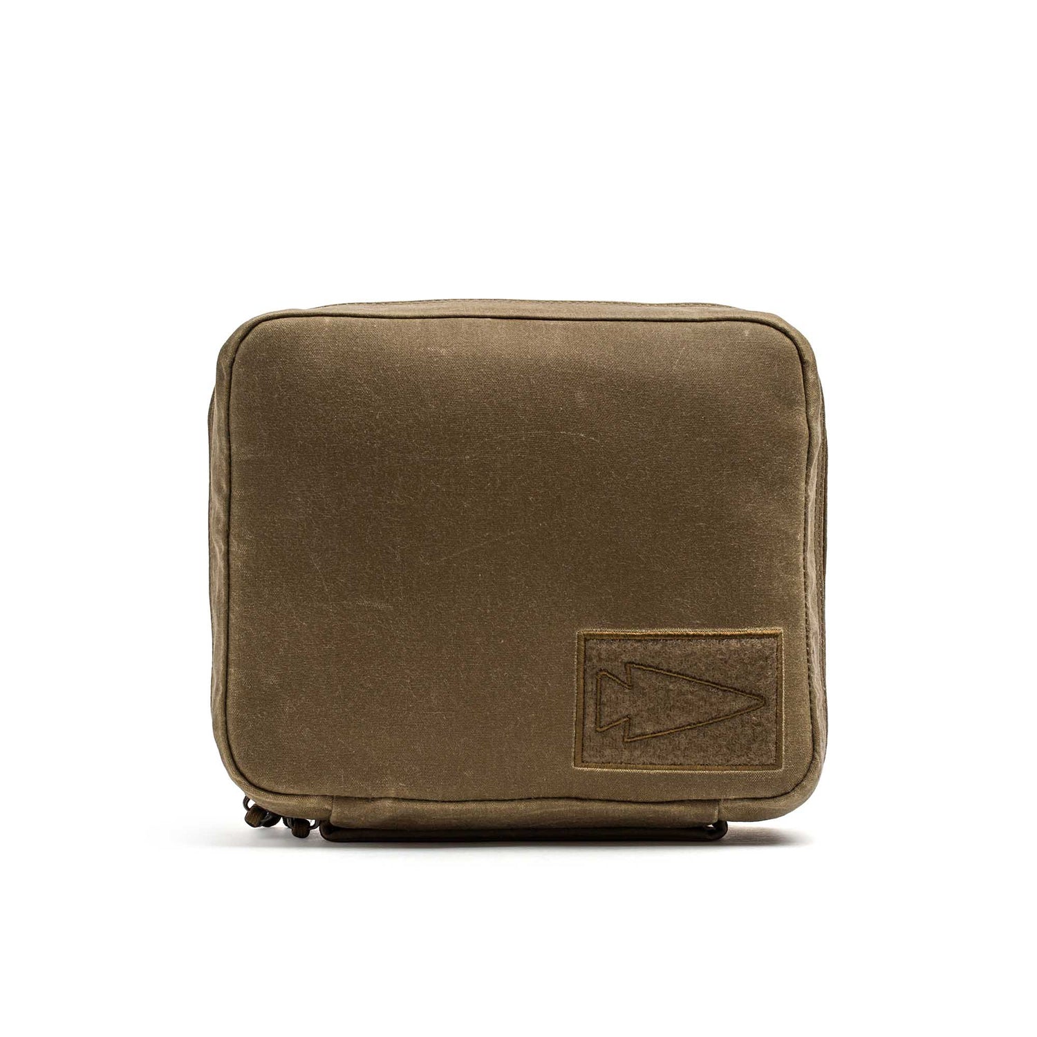 The GR2 Field Pocket - Waxed Canvas is a square olive green pouch made from waxed canvas, featuring a stitched arrow patch on the lower right corner and inspired by classic field pocket designs.