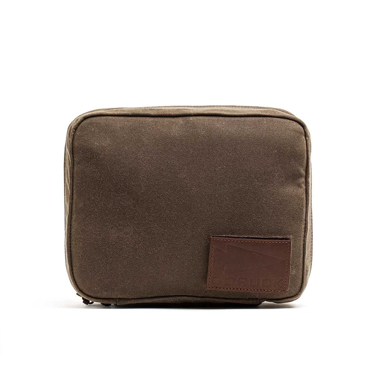 The GR2 Field Pocket - Waxed Canvas is a brown, rectangular organizer featuring a Red Wing Leather patch on the lower right corner.