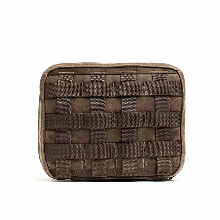 GR2 Field Pocket - Waxed Canvas in brown, featuring woven webbing on the front, shown against a plain white background.