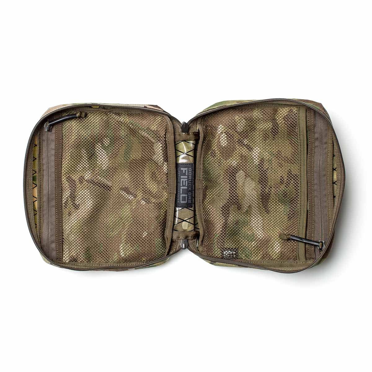 The GR2 Field Pocket - X-PAC, made from waterproof fabric with AquaGuard zippers, is shown open on a white background, displaying mesh pockets on both sides.