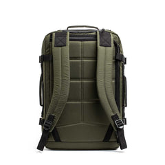 The GR3 - X-PAC carry-on backpack is shown from the back, featuring an olive green design with padded shoulder straps, a top handle, and a dedicated laptop compartment.