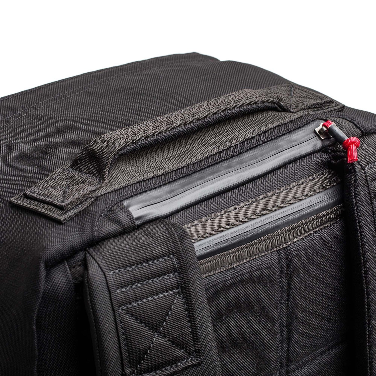 GORUCK black rucksack close-up showing durable handle and reinforced stitching