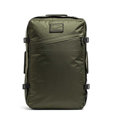 The GR3 - X-PAC is an olive green carry-on backpack featuring side buckles, a diagonal front zipper, waterproof material, and a GORUCK logo patch on top.