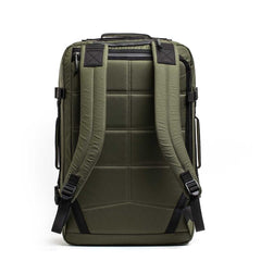 The GR3 - X-PAC is an olive green waterproof carry-on backpack with padded shoulder straps and black accents, displayed from the back on a white background.