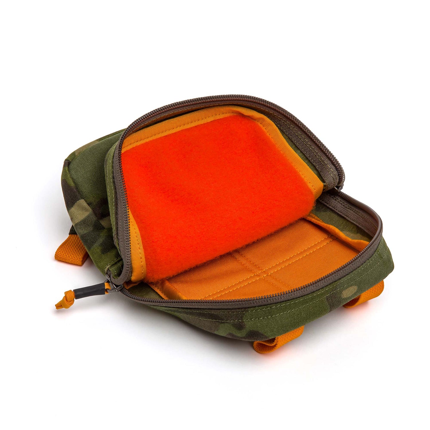 The Cordura GRenade is a camouflage pouch with a bright orange interior, zipper closure, padded sections inside, and is crafted from tough 500D Cordura fabric.