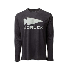 The Men's GORUCK Spearhead Long Sleeve - Tri-BlendX is a dark gray shirt with a large white spearhead and "GORUCK" on the front, inspired by classic Special Forces designs.