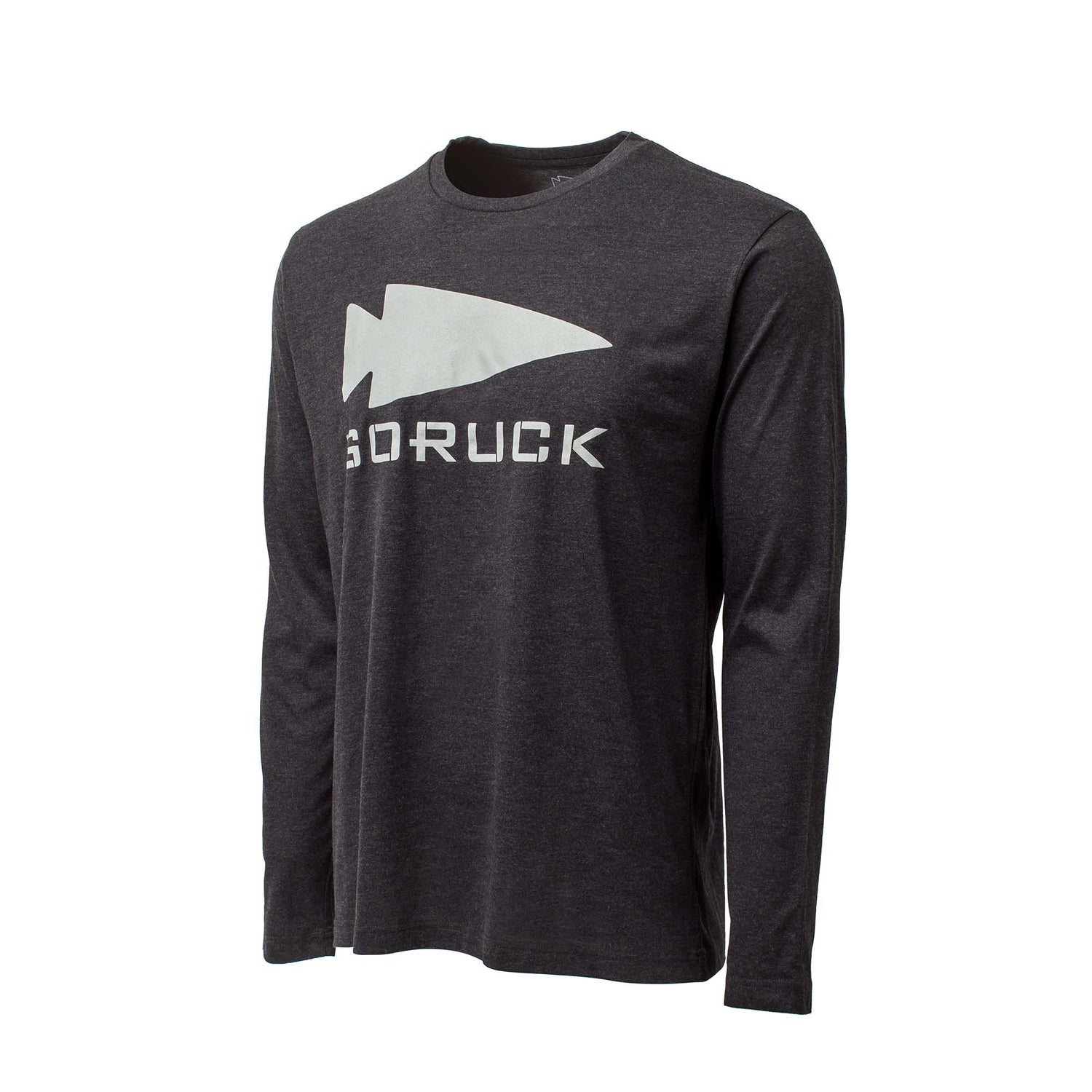 The Men's GORUCK Spearhead Long Sleeve - Tri-BlendX features a dark gray color, long sleeves, and a large white GORUCK spearhead with 