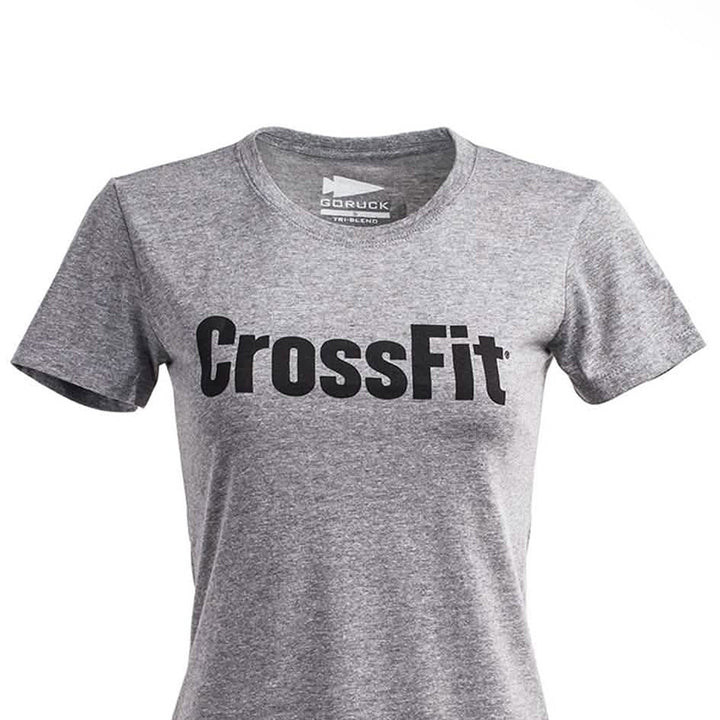 Introducing the Women's CrossFit Tee - Tri-Blend by GORUCK: A premium tri-blend gray T-shirt featuring "CrossFit" printed prominently in bold black letters on the front, proudly made in the USA for quality you can trust.