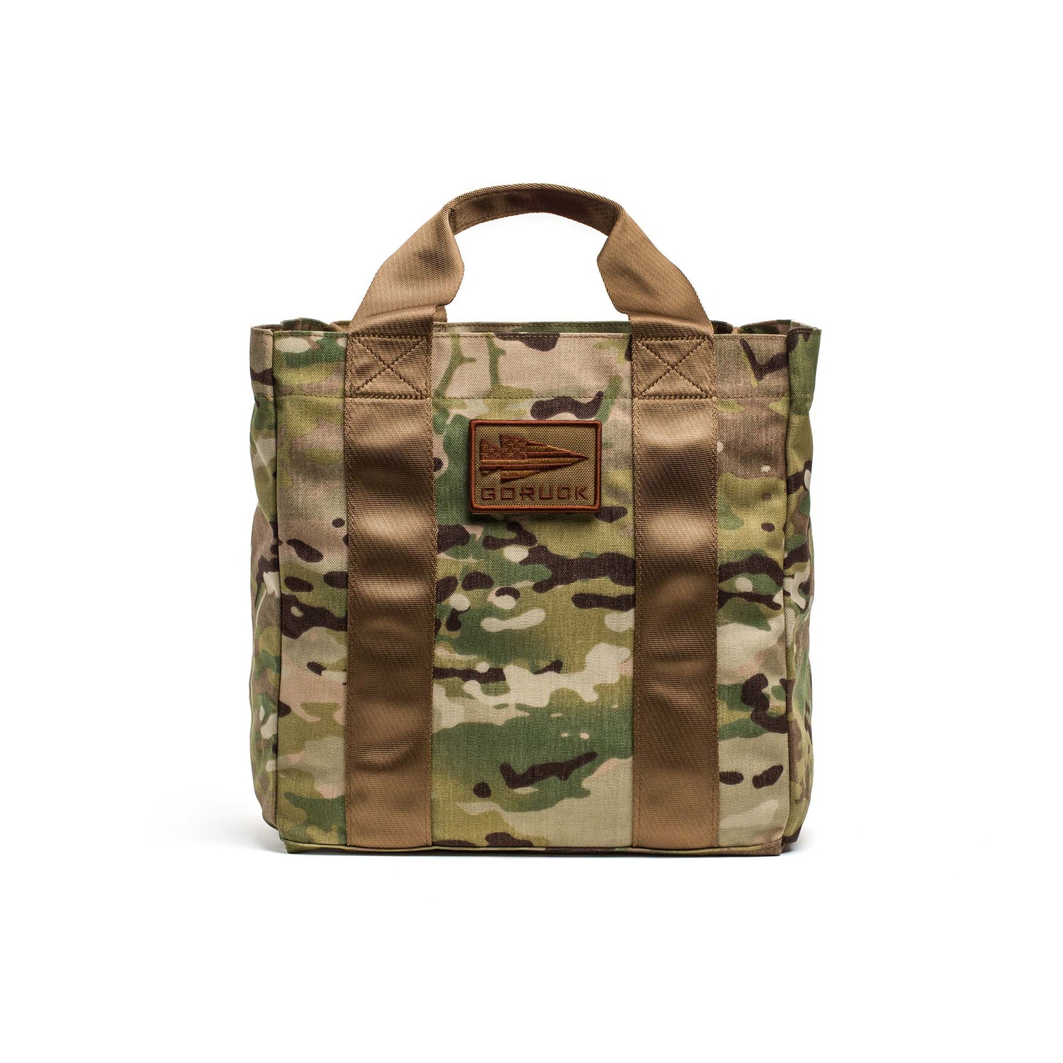 The Grocery Getter is a camouflage all-purpose tote bag with tan handles, made from durable 1000D Cordura and finished with a signature GORUCK patch on the front.