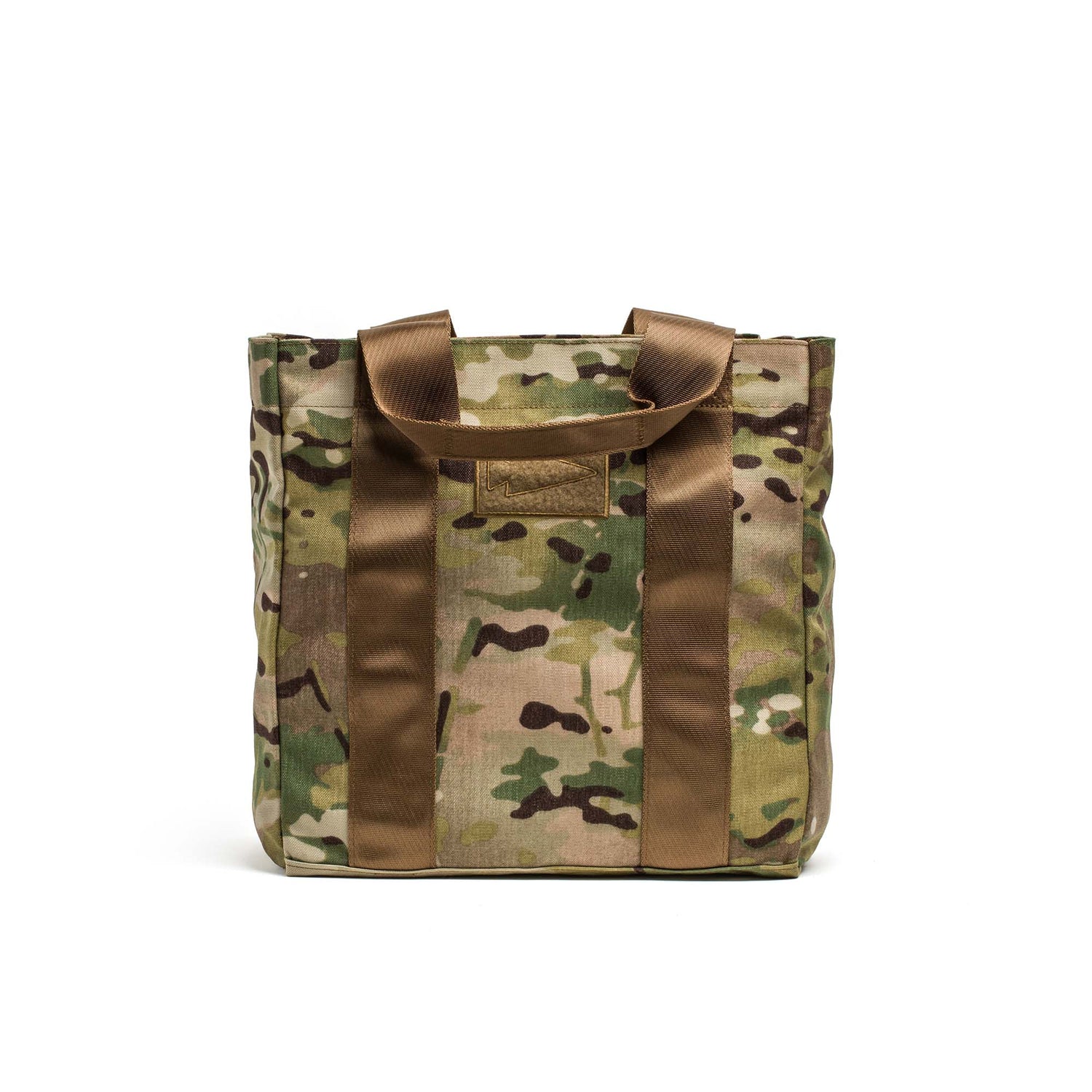 The Grocery Getter tote, featuring a camouflage design and rugged 1000D Cordura build with sturdy brown handles, stands upright on a white background.