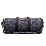 GORUCK 38L gym bag in black frogskin camo with shoulder strap and American flag patch