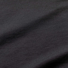 Close-up of black Heavy Merino wool fabric texture from GORUCK rucking gear