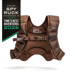 A brown GORUCK Spy Ruck weighted vest for women with a buckle closure, displayed next to a black badge noting it as one of TIME’s Best Inventions of 2026.