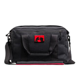 GORUCK black kit bag with shoulder strap, front red samurai patch, durable rucking gear