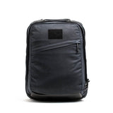 GORUCK black waxed canvas rucksack with top stash pocket, rugged outdoor backpack