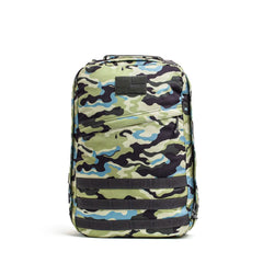 The GR1 USA - Cordura backpack features a camo pattern, front zipper pocket, and black horizontal straps, displayed against a white background.