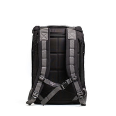 GORUCK black rucksack back view with padded shoulder straps and sternum strap on white background