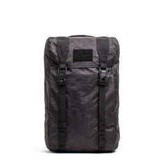 GORUCK black Dyneema rucksack, rugged outdoor backpack with buckle straps on white background