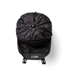 GORUCK black Dyneema rucksack top view with open pocket, visible rugged interior