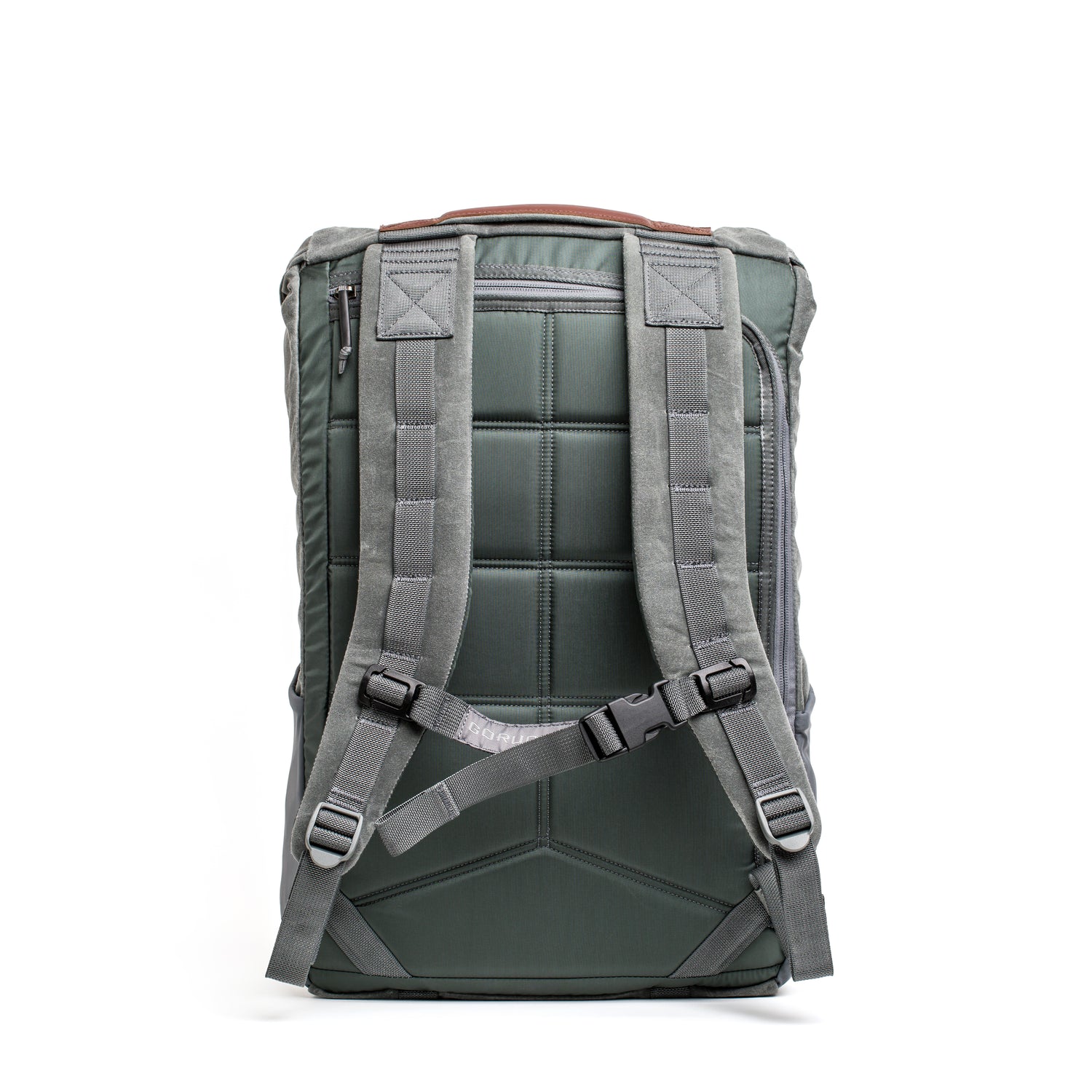 Back view of the M24 - Waxed Canvas rucksack by GORUCK, showcasing durable materials with extra padded shoulder straps and a top handle, set against a white background.