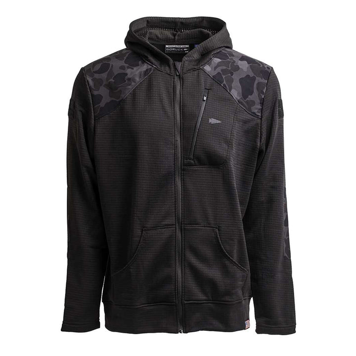 Introducing the Men’s Full Zip - Polartec Grid Fleece by GORUCK, a black hooded jacket showcasing a camo pattern on the shoulders and sleeves. It features a front zipper and pocket details, crafted with Polartec Power Grid fabric for superior breathability and warmth.