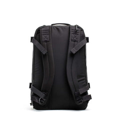 Back view of black GORUCK Mesh Ruck backpack with padded shoulder straps and top handle