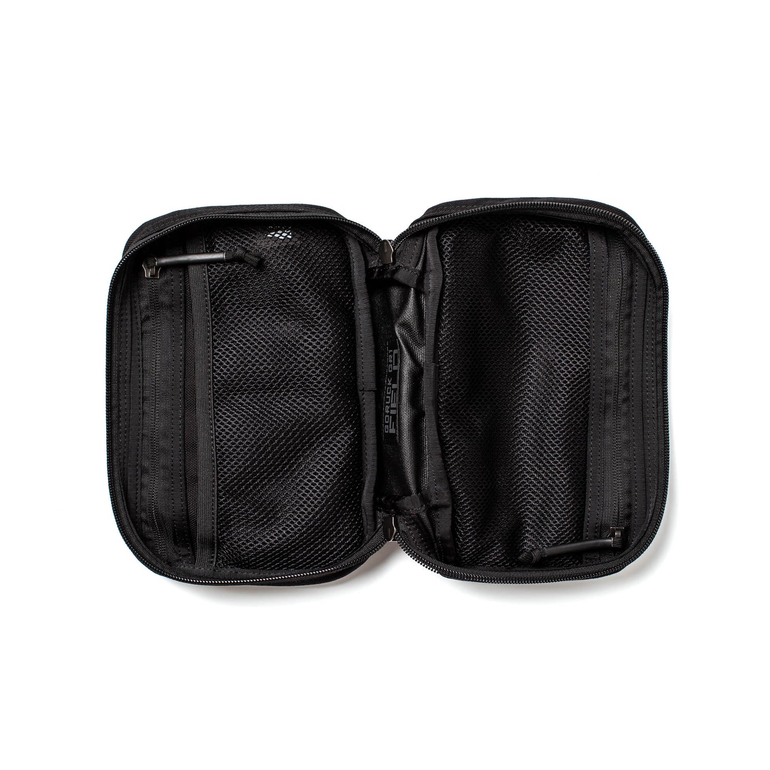 The GR1 Field Pocket - USA is an open black zippered pouch with mesh compartments and pockets, perfect as a dopp kit or electronics organizer, shown on a white background.