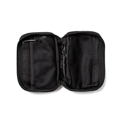 The GR1 Field Pocket - USA is an open black zippered pouch with mesh compartments and pockets, perfect as a dopp kit or electronics organizer, shown on a white background.