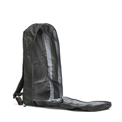 The Packable Bullet Ruck - Ripstop ROBIC® is shown empty, fully unzipped and upright on a white background—highlighting its sleek, lightweight design and durable AquaGuard zippers.