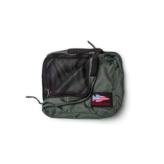 Packing Cubes made from durable 200D nylon in green, featuring a mesh zippered pocket for travel organization and a GORUCK patch with an American flag.
