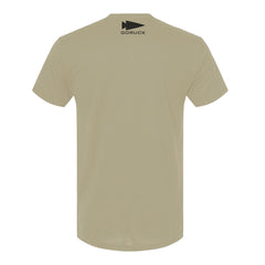The Selection Jax Beach 2025 - Tri-Blend tee in beige is shown from the back, featuring a black GORUCK logo near the neckline. Made from premium tri-blend fabric for enduring comfort that embodies grit and resilience.