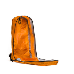 The Packable Bullet Ruck - Ripstop ROBIC® is a lightweight, bright orange travel backpack shown with its main compartment unzipped and open against a white background.