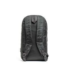 The Packable Bullet Ruck - Ripstop ROBIC® is displayed from the back, featuring padded shoulder straps and a top handle on a white background—an ideal lightweight day bag.