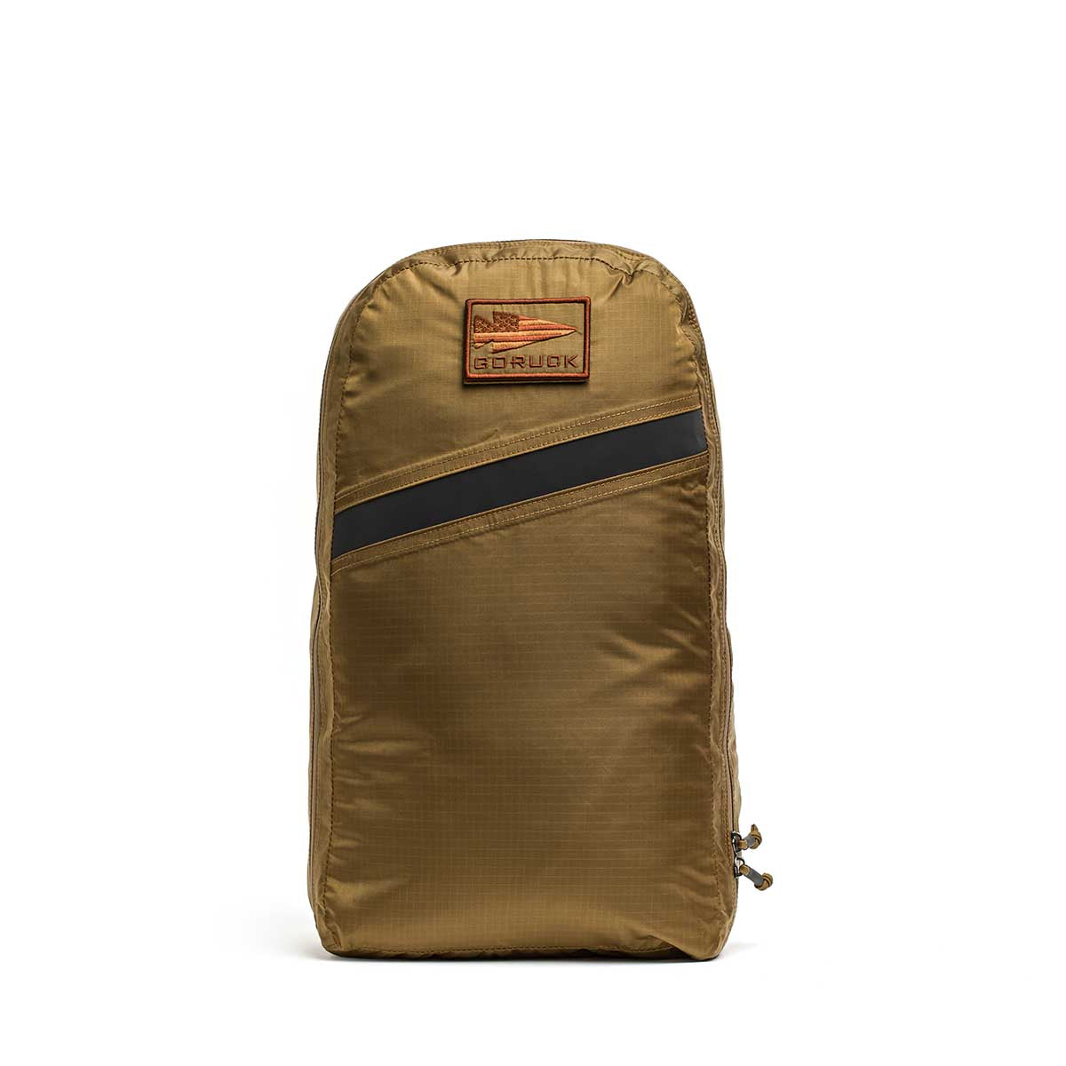 The Packable Bullet Ruck - Ripstop ROBIC® is a brown lightweight travel backpack featuring a diagonal black stripe and a rectangular GORUCK patch on the front.