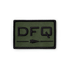 The Patch - DFQ is a green and black embroidered patch with "DFQ" lettering, a small arrow beneath, a VELCRO hook backing—ideal as your new Don’t F***king Quit accessory.