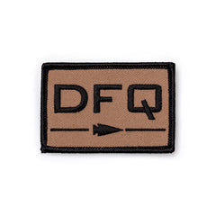 The Patch - DFQ is a rectangular Velcro patch featuring "DFQ" lettering and a bullet icon on a tan background with a black border.