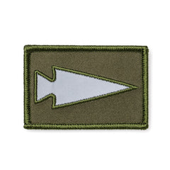 Reflective spearhead patch with green border on olive fabric, GORUCK rucking gear accessory