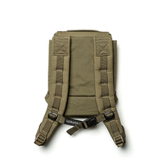 The RPC 3.0 + 10lb Ruck Sandplate is a khaki green backpack styled like a Ruck Plate Carrier, featuring padded straps and a black buckle, displayed flat on a white background.
