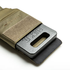 A 10lb Ruck Sandplate is partially inserted into a tan RPC 3.0 carrier with “GORUCK” branding—perfect for weighted training.