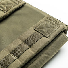 Close-up of the olive green RPC 3.0 + 10lb Ruck Sandplate with reinforced stitching, designed for weighted training or pairing with a Ruck Plate Carrier, shown folded against a white background.