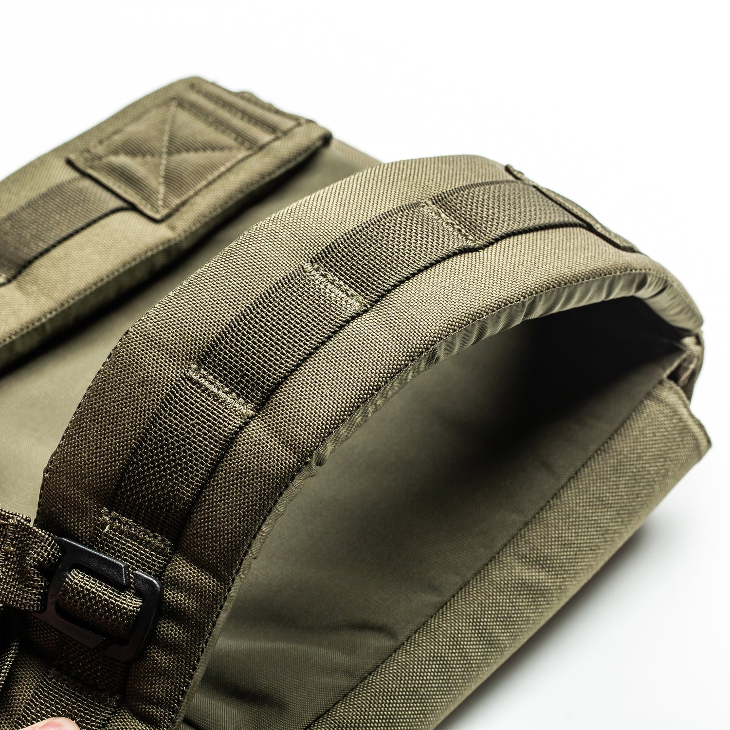 Close-up of RPC 3.0 + 10lb Ruck Sandplate olive green shoulder straps with black buckle, designed for use with a ruck sandplate, against a white background.