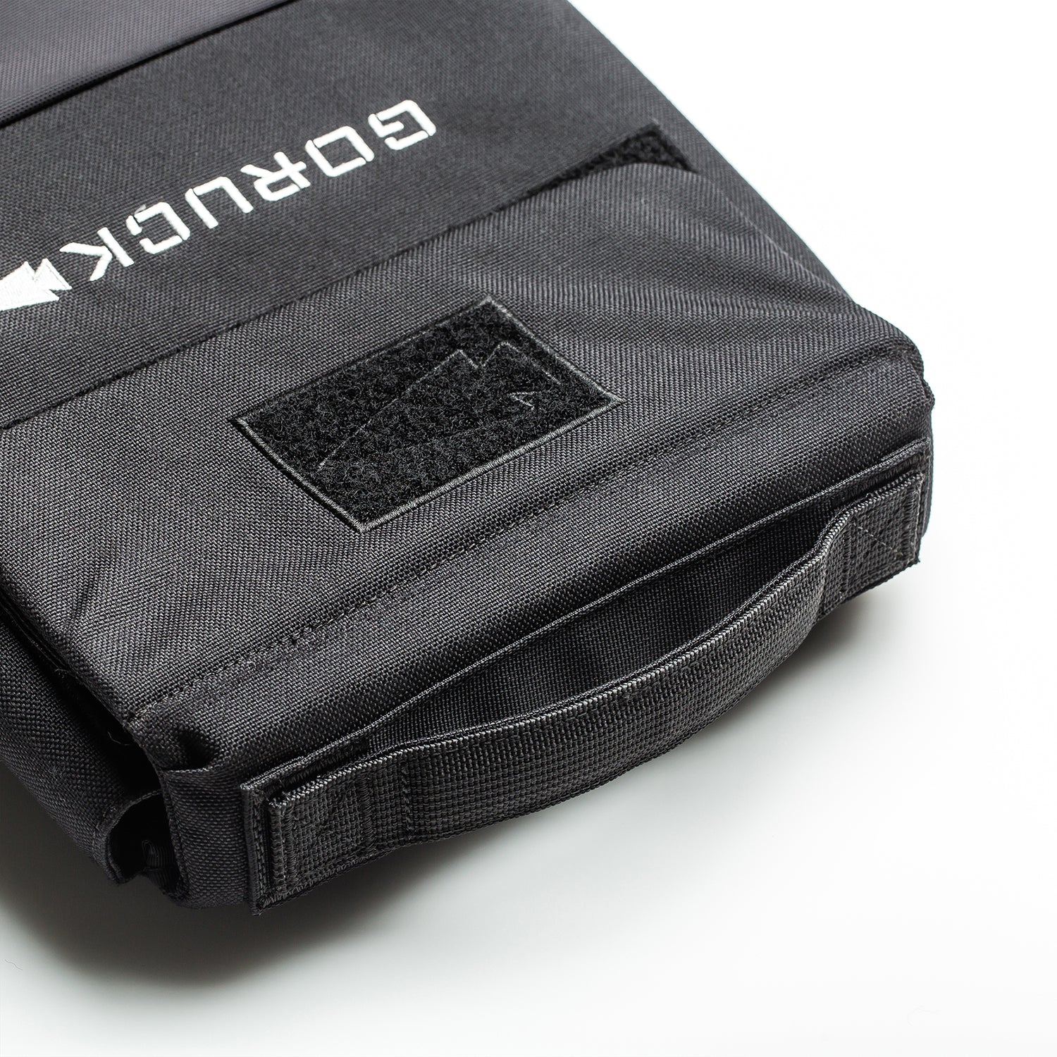 The RPC 3.0 + 10lb Ruck Sandplate is a black GORUCK backpack with a handle and Velcro patch, designed to hold a ruck plate for weighted training. Shown on a white background.