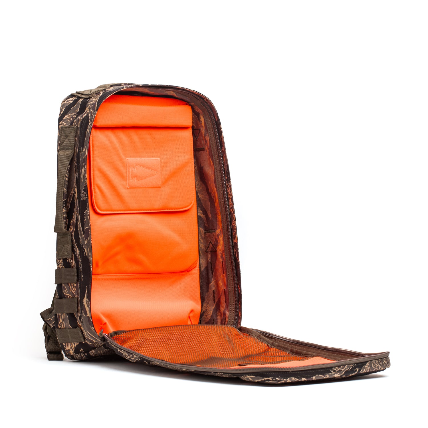 The Rucker 4.0 is a camouflage rucking backpack with an open front showing a bright orange padded interior and mesh pocket, ideal for weighted training and ruck plate compatible.
