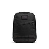 GORUCK black ballistic nylon rucksack with American flag patch, front view on white background.