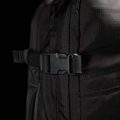 Close-up of black GORUCK rucksack buckle and durable ripstop fabric with stitching detail