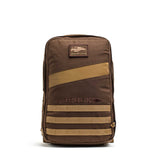 The Rucker 4.0 is a brown tactical rucking backpack with tan accents, front MOLLE webbing, a GORUCK patch near the top, and is ruck plate compatible for enhanced training versatility.