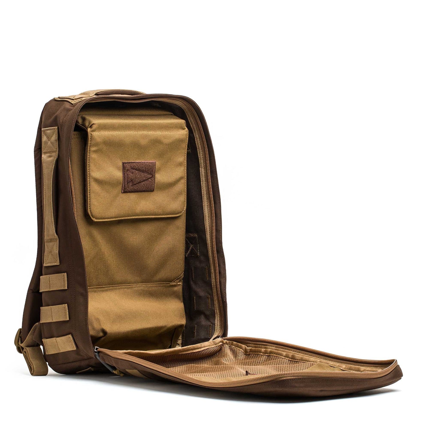 The Rucker 4.0, a brown rucking backpack with tan accents, features multiple interior compartments and pockets, is ruck plate compatible, and ideal as a gym rucksack, displayed on a white background.